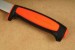 Morakniv Basic 511 black and orange Arbeitsmesser aus Carbonstahl