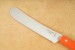 Opinel Frhstcksmesser orangefarbener Buchenholzgriff